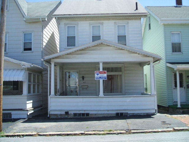 Great starter home or investment property. Large rooms, eat-in kitchen, attic could be a 4th bedroom, hardwood under carpet, fenced yard.