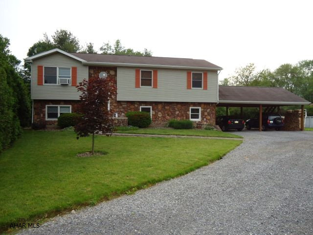 Nice setting for this Bi-Level home in Tipton. Above ground pool, 2 car carport. All kitchen appliances included. Lower level Family Room. Gas forced air heat or coal/wood furnace for lower heat costs.