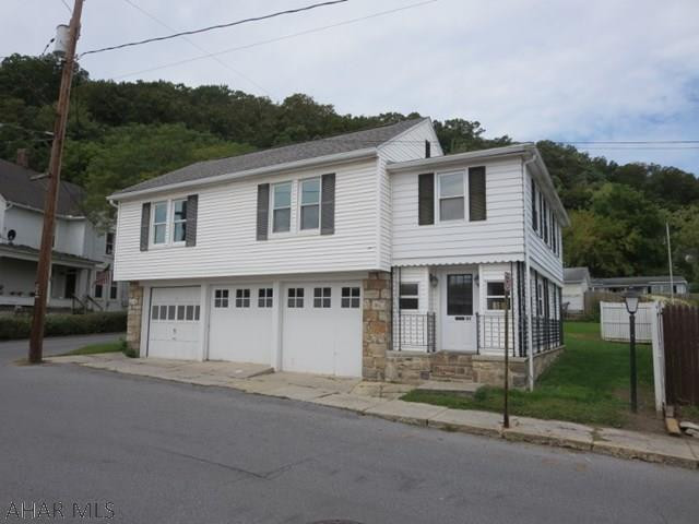 Large rooms, new floors in most of house, remodeled bathroom highlight this home which is located a short 2 blocks from downtown Everett. 3 bay garage provides lots of space for parking. 9x 25 room in basement with stone wall and tile floor would be ideal sun room. This home is in excellent condition and has been well maintained.