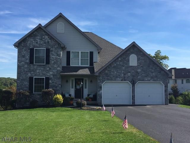 Come see this spacious home in Fox Hollow offering the Hollidaysburg SD and gorgeous views! This 4 bedroom 2.5 bathroom home boasts a large kitchen with cherry cabinets, SS appliances, tile floor, and an eat in area overlooking the mountains. There are two living areas offering the space you have been looking for and a gas fireplace to stay warm and cozy during the winter months. Master bedroom is very large with a master bath, Jacuzzi tub, shower, tile floor and double sinks. The other 3 bedrooms are generous in size with large closet space. 2nd floor laundry. Walk-out basement has a bonus room and an unfinished area that is ready to finish! Two decks give you an expansive entertaining area to enjoy in summer months. Stop reading and start calling to schedule your appointment today!