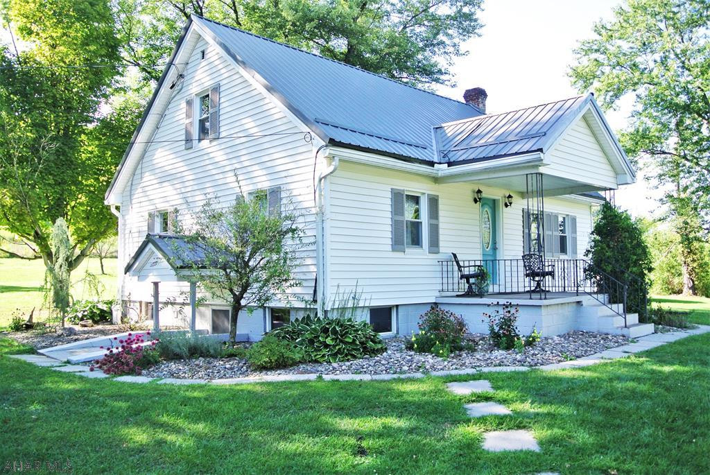 Exceptionally Beautiful Cape Cod style home in the Spring Cove School dist.   The 4 bed home has been tastefully remodeled from top to bottom. It offers, a gorgeous new kitchen w/ a solid surface countertop, New Bamboo Flooring, New tile, new bath with large soaking Tub, Fingerprint less SS appliances, new fixtures, paint, trim and New Metal Roof.    You are move-in ready for many years to come.   This darling home also sets on a large .77 acre parcel with some breath taking landscaping.  Entertain your guest with the outdoor areas , firepits, and covered porch areas.  What a great home!