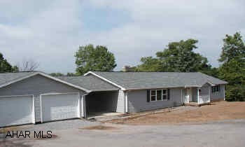 100% Rebuilt large 1629 S.F. rancher .99 Acre lot.Breezeway, Rear Deck, Fierplace in LR, renewed inside and out - must see.