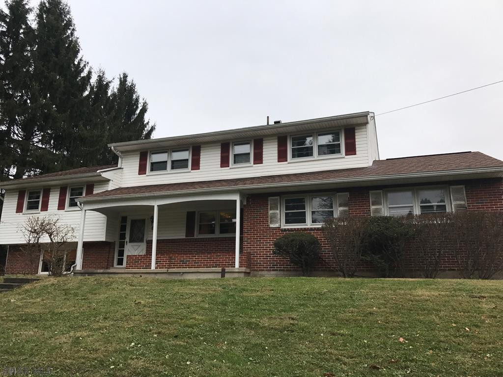 Spacious home offers 5 bedrooms, 2.5 baths, hardwood floors. Home offers large bright  living room  with cathedral ceilings and fireplace, family room on lower level with half bath, central vac. This is a well built home in an established neighborhood. Seller is offering $500 allowance for buyer to remove the carpet.