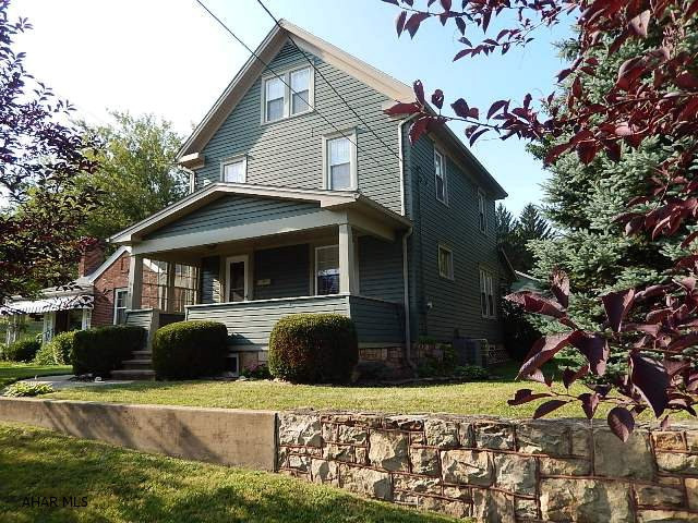 2.5 story home. 3 or 4 BR's. Nicely remodeled. New kitchen w/tile floor, all stainless steel appliances included. Thermo pane windows. Double lot 70x186. Garage 24x50 (holds 6 cars w/work shop). Vaulted ceilings w/wood heat & 1/2 bath. Hardwood floors throughout home, central air, covered porches, updated mechanics, 100 amp elec. Off street parking.