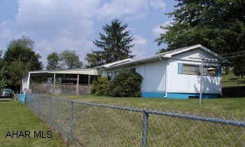 1970 single wide mobile home on full foundation.