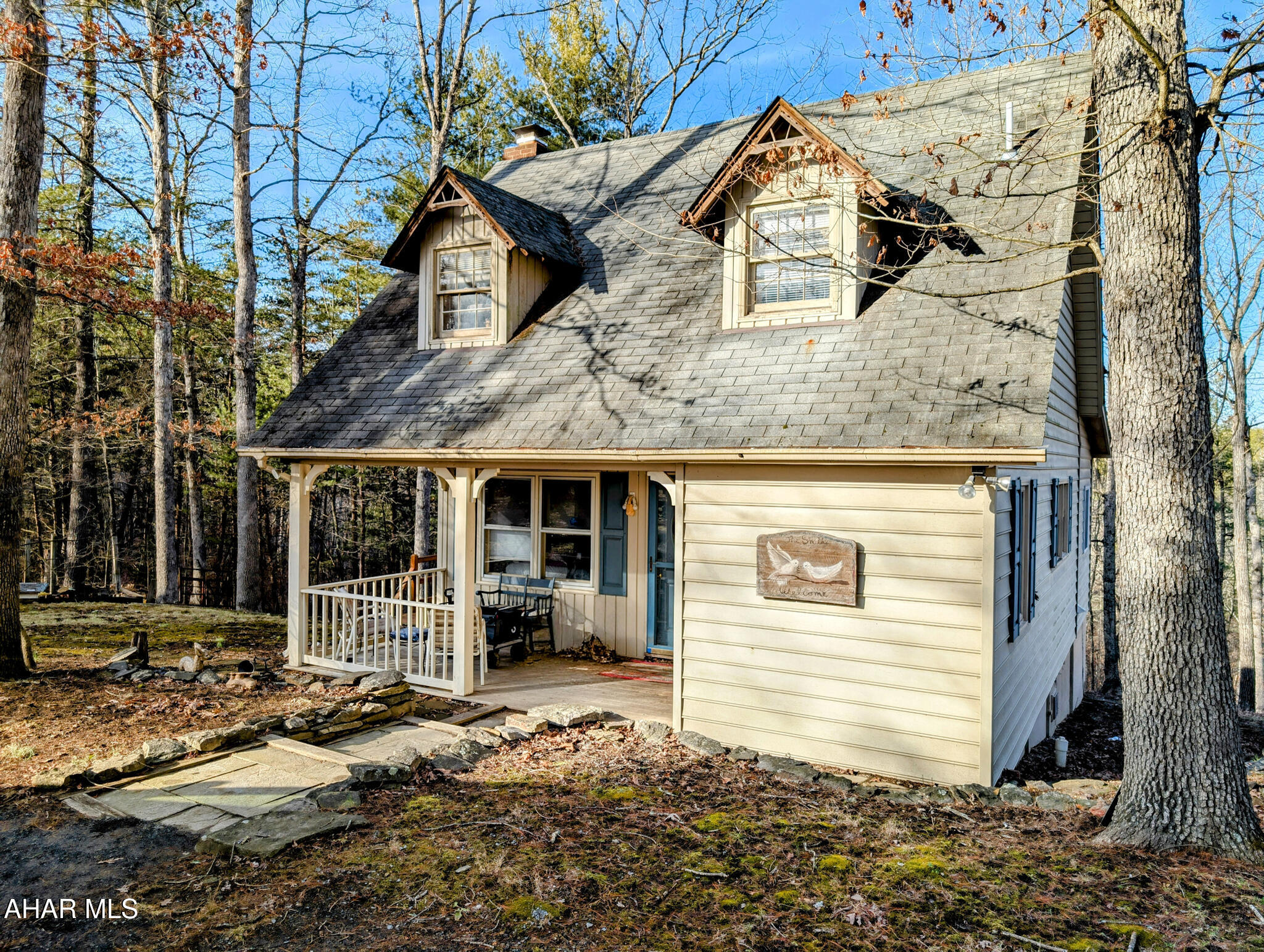 Relax at this beautifully situated mountain home in Clearville on almost 19 acres bordering Buchannan State Forest.   The home has a beautiful country kitchen, full laundry, and wood fireplace.  This property also boasts a two car garage and an unfinished above garage accessory unit with the potential for another bedroom and bathroom when finished. The property has a dirt circular driveway, a shed, and a creek down the hill from the home. Located just a quick drive from Everett, Artemas, Warfordsburg, Flintstone down Route 26. What more could you ask for? Call me to take a tour today!