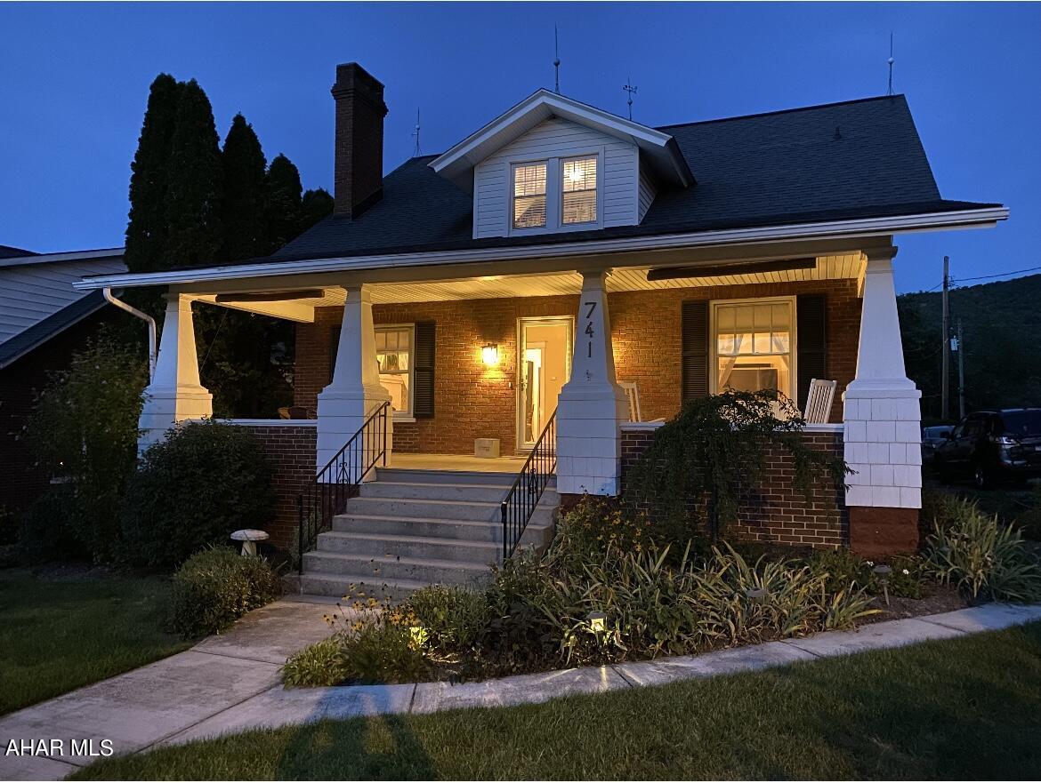 REDUCED!!.....Brick Beauty on Juliana St. the back of lot has a view of the mountains and Elks golf course. Great front porch for sitting and relaxing. Large living room with natural gas fireplace. dining room, kitchen, main floor bedroom or sitting room and full bathroom. 3 bedrooms upstairs,  with a small deck off the 3rd bedroom. Full bathroom and upstairs laundry with 1/2 bath . Mother in law suite on first level , with kitchen, living room, bedroom and full bath. Central air, natural gas heat, oversized one car garage. Many unique features and lots of extras.  Open House Sunday Oct 15th from 1-2:30.