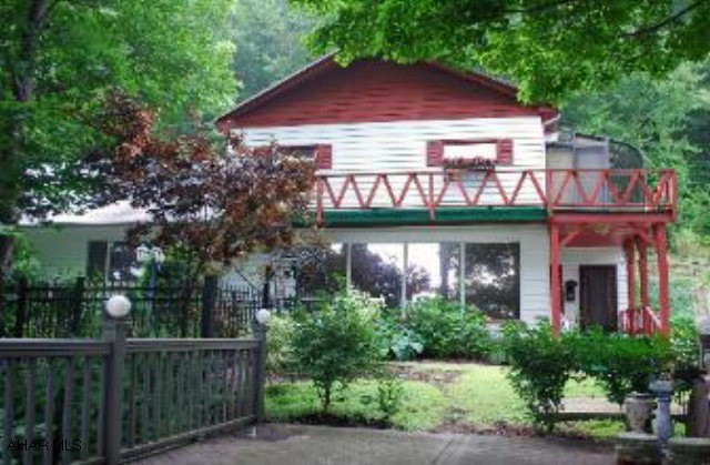 7 bdr, 2 3/4 baths former bed & breakfast on 7 private wooded acres.  Gateway to State Park & Rock Run, within in minutes to universities.  Property has a solarium, gazebo, & deck with scenic views.  Japanese & English gardens. Black top driveway.  Property is also suitable for a single family home.