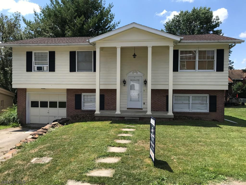 Great family home and location in Eldorado.  New central air, roof, and hot water tank.  Hardwood floors on main level.  Dining room has door to deck.  Family room has movable bar and door to patio in rear.  Integral garage keeps you dry while unloading groceries and the snow off your vehicle.  Convenient to shopping and I-99.  Don't miss the opportunity to get in this great neighborhood!