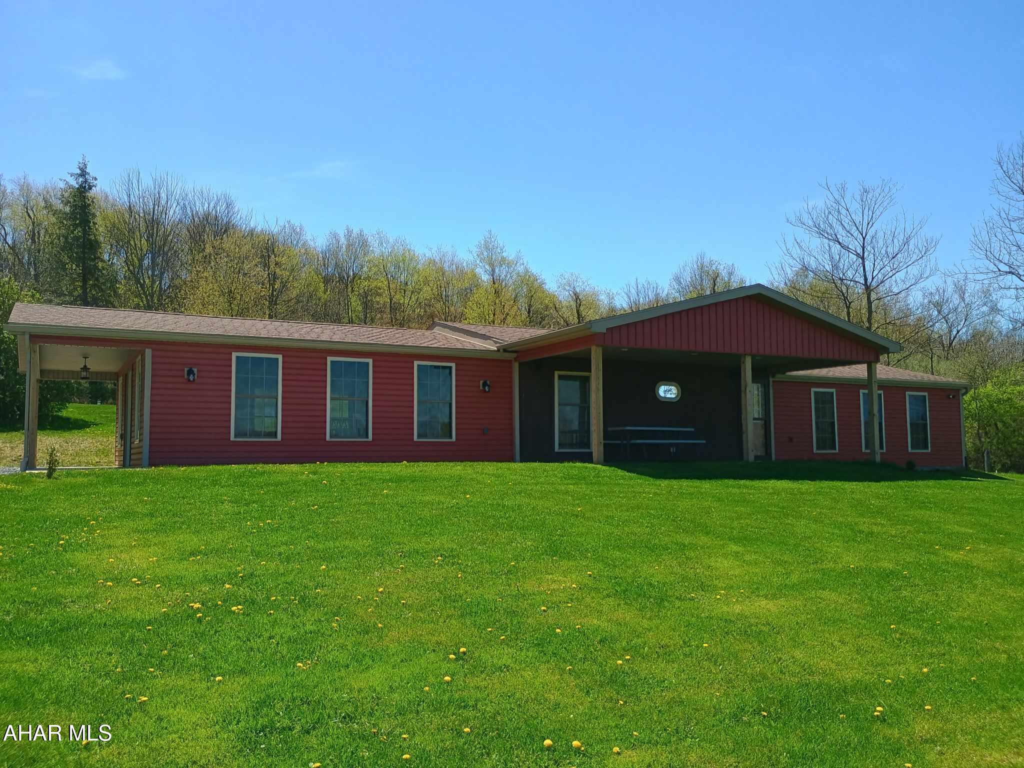 Are you looking to rent in a secluded area?  You don't want to miss this rare opportunity.  This 4 Bedroom, 1 Bath is surrounded by 32 acres of wooded area.  Enjoy the fresh air from the covered patio out front.  This home has a gorgeous view, spend your evening relaxing enjoying the natural surroundings.  Upon entering the home is an enclosed sunroom with lots of natural light.  Inside you will find 3 bedrooms, an immaculate kitchen, and a large living room.  This home is a must see, it even has central air. You won't be disappointed!  Rent is 1500 per month.   Enjoy not having a water bill as this home has a well.   The home also has a septic system, so no sewer bill either.  $1500 security deposit is required.  This home is available June 1st.  Buyer pays electricity, heat and trash removal.  Landlord will take care of the yard and driveway maintenance.***Some restrictions apply.  Please ask for a copy of the tenant restrictions