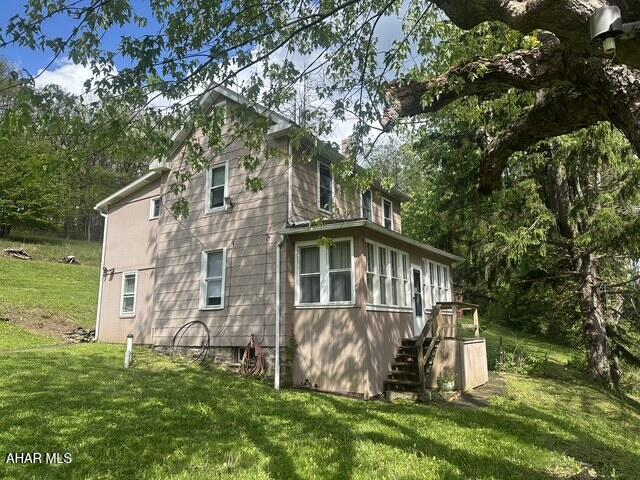 If you have always wanted to live in the country with some land to spread out, this Handy Man's Special is the property for you.    Sturdy two car detached garage with electricity.    Beautiful ground with so many possibilities.