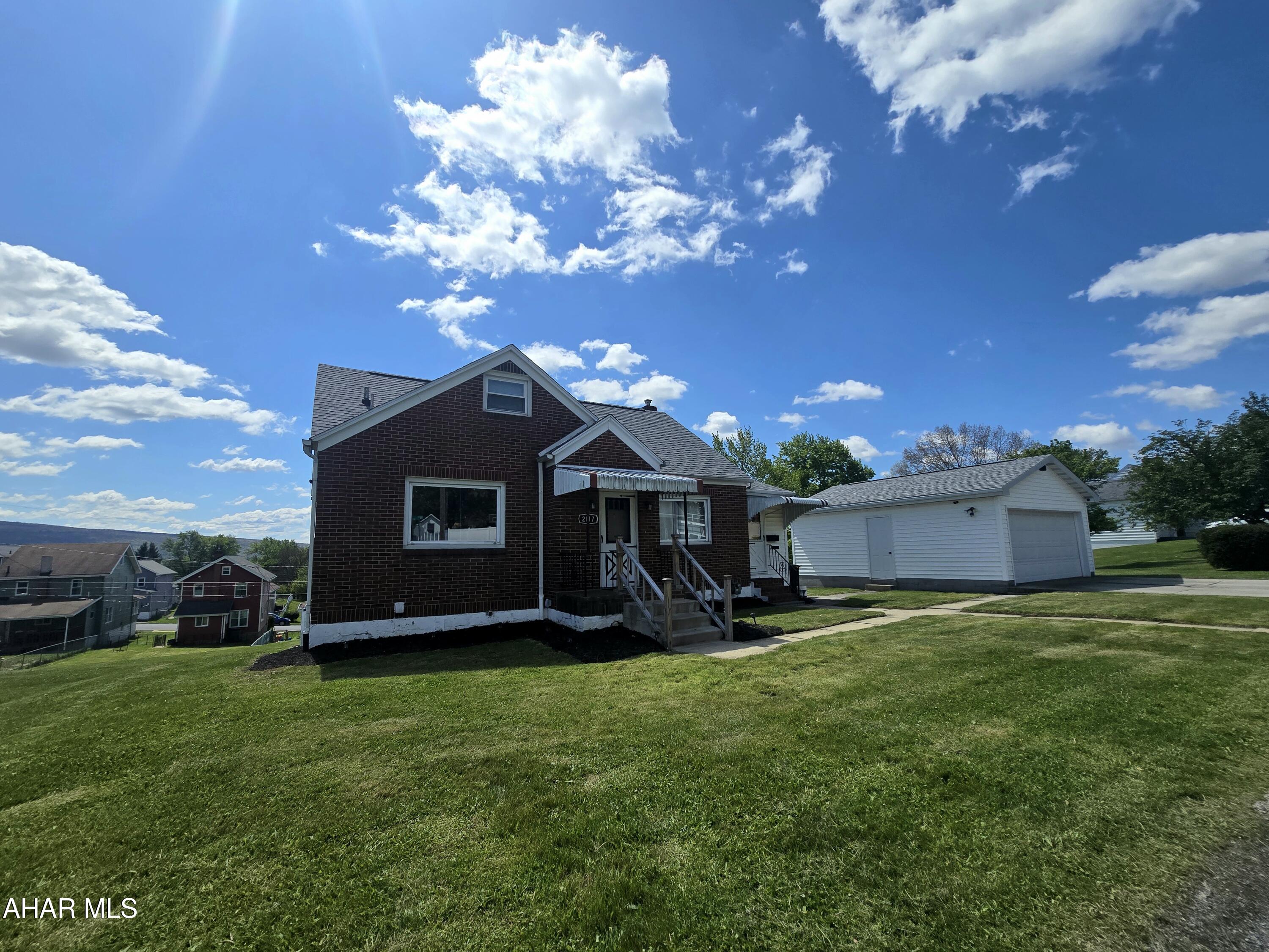 Westfall Park Charmer!  Situated on just under half an acre this 3-bedroom 2 full bathroom home is the perfect mix of modern updates and classic charm.
The main level is bright, open, inviting, and offers the option for first floor living. Enter into the living room where you then find 2 bedrooms, a recently renovated full bath, dining room, and updated kitchen with next to new appliances. The second floor offers endless potential with a 3rd bedroom, and office for multiple possibilities.   The basement provides an additional living space, full bathroom, den, and fully functional kitchen with option for private entrance for added convenience. The low maintenance exterior features brick, a new roof, off street parking with detached garage, and large lot for unlimited potential. Call listing agent for your private showing.