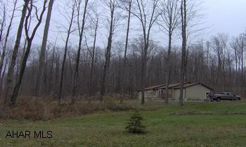 Great country location! 3 bedroom 2 bath ranch on 7.8 acres.