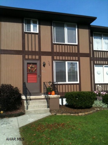 Lower Price!!! IMMACULATE 2 bedroom 1.5 bathroom townhouse.  Priced to sell and BRAND NEW CARPETING!!  Great location, Convenient. Full Basement with washer and dryer.  Gas forced air heat and central air.  Back patio/lawn.  Two Nice Size Bedrooms with lots of storage.  Basement could easily be finished.  Realtor owned. NO flood insurance required.  NO HOA fees. Have a new home for Christmas!