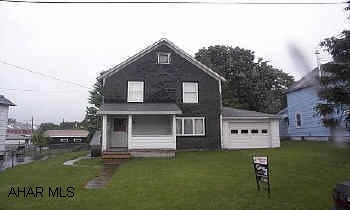 good starter home with attached garage on nice lot.