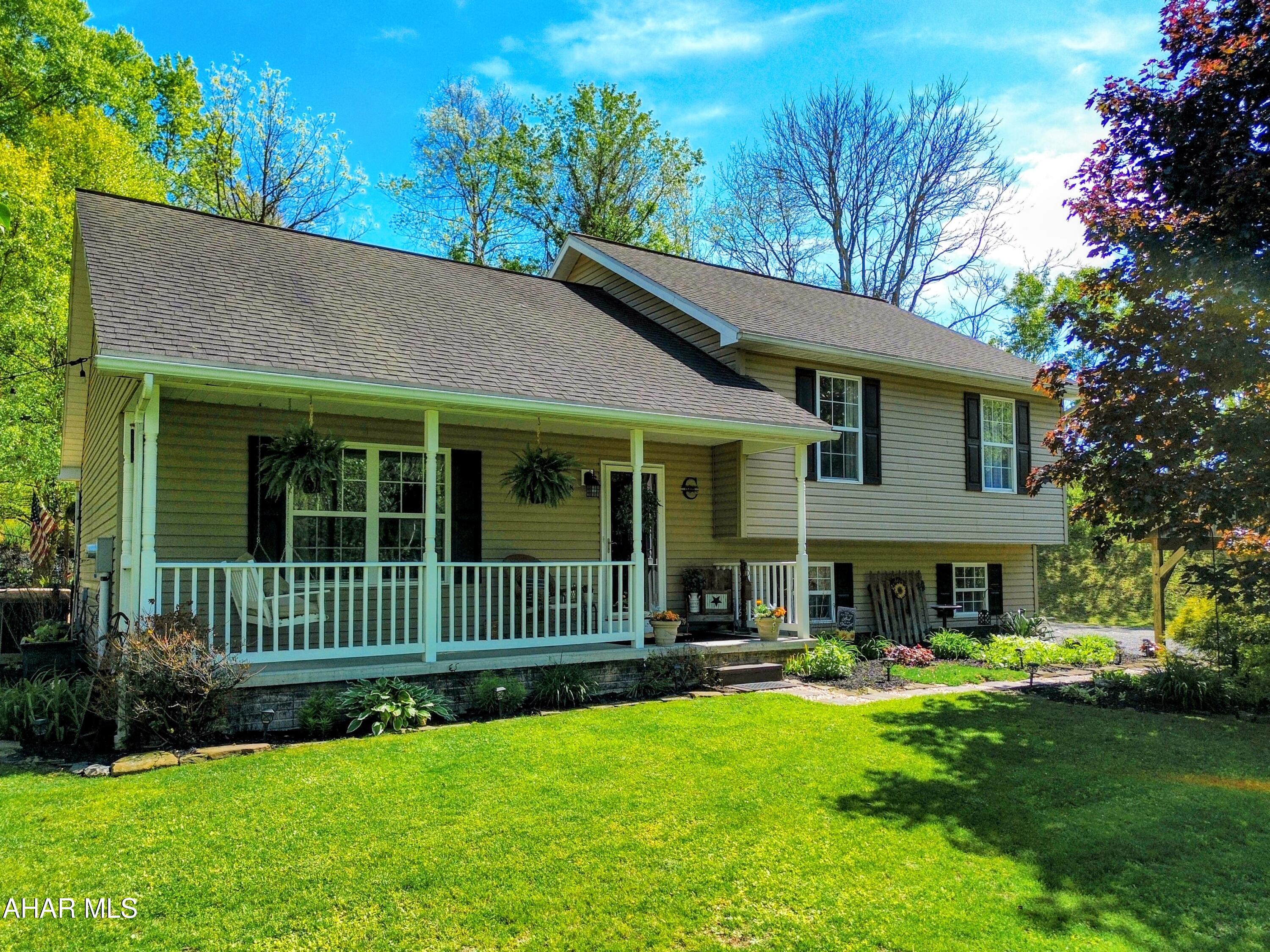 Tucked away on 1.2 beautiful acres, this exceptionally well-maintained 4 bedroom, 3 bathroom home offers the perfect blend of privacy, comfort, and modern updates. From the moment you arrive, you'll appreciate the pride of ownership throughout this move-in ready property.

Inside, the home features a modern kitchen complete with stainless steel appliances, garbage disposal, and plenty of space for cooking and gathering. The spacious layout offers room for everyone while maintaining a warm, inviting feel. Central air keeps the home comfortable year-round, and every inch of the property reflects meticulous care and cleanliness.

Step outside and fall in love with your own private backyard oasis. Whether you're relaxing in the hot tub, entertaining guests, or simply enjoying the peaceful surroundings, this outdoor space was designed to unwind and enjoy nature. A brand-new carport and additional shed provide excellent storage and convenience.

If you've been searching for a clean, beautifully maintained home with privacy, outdoor enjoyment, and modern comforts, this property is a must-see!