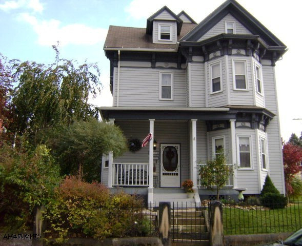 Updated Victorian on double corner lot.  Spacious home features 3 large bedrooms, 1 1/2 updated bathrooms,updated kitchen, 1st floor laundry, spiral staircase, private rear multi patio and covered porch.  Tastefully landscaped. 3 zone heat. Great Mechanics. 12 month average gas bill of $97.  3 Zoned heat.