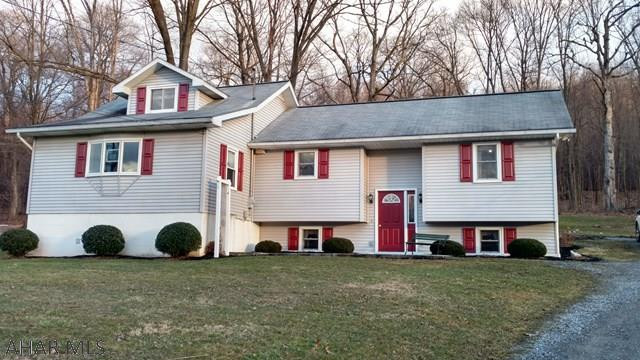 Better not wait on this one-it won't last! Original part of home built in 1952, in 2000/2001 owner gutted and redid original part and added a beautiful bi-level home addition. Master bedroom suite, spacious kitchen, so, so nice. On top of that, 6 acres of country living-garages and out building. Must see!