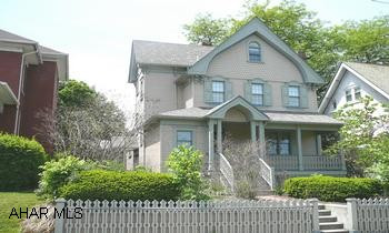WIRED FOR SEC. SYSTEM, 4-ZONED HEAT, RADON SYSTEM IN PLACE. LOVELY PRIVATE GAZEBO IN REAR, STAINED GLASS. VICTORIAN STYLE IN THE HEART OF H-BURG, 3BR'S ALL WITH THEIR OWN BATH. CENTRAL VAC. SEP. HEATED WORKSHOP OR OFFICE. FINISHED LOWER LEVEL WITH BEAMED CEILING. CALL SHARON 329-2516.