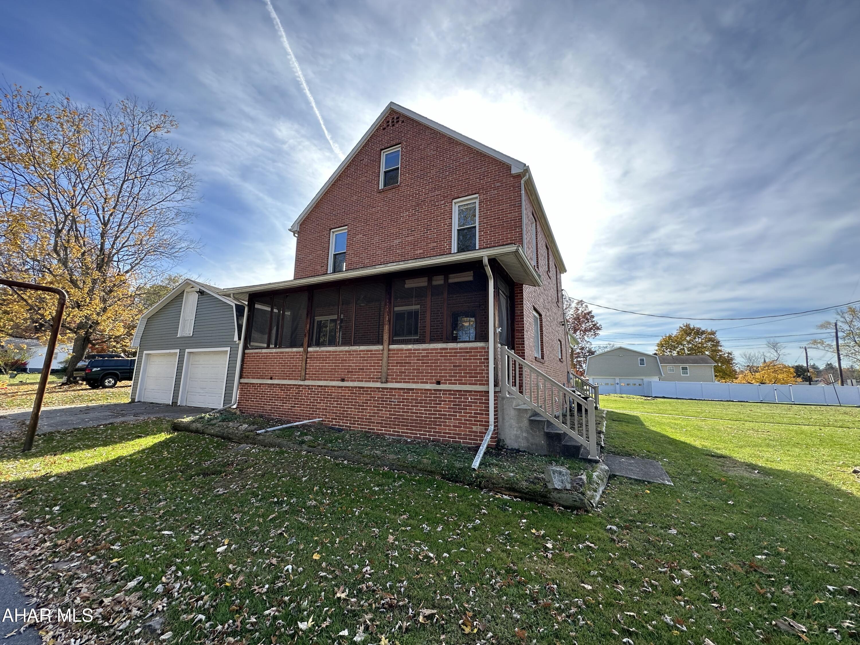 Price Reduced!! Check out this beautiful 2 1/2 story home in Hollidaysburg on large level lot, large kitchen and dining area, main floor full bath, flexible floor plan, 4 bedrooms on the second level and finished open attic with wood floors, enclosed front porch, covered deck to the back of the house overlooking the corner lot, detached two car garage with 8' doors and a detached one car garage, come take a look