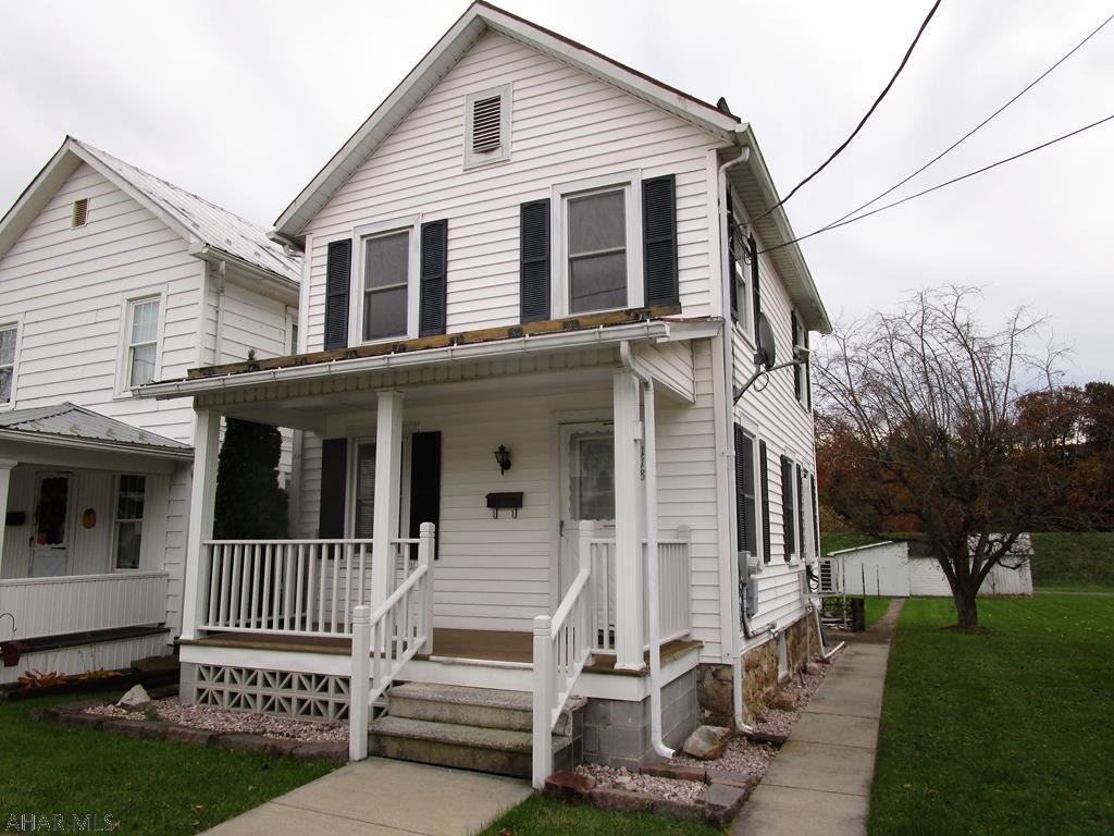 Why rent when you can OWN this home for less than the price of rent????  Home qualifies for 100% USDA financing or FHA financing. Well maintained and move-in ready home situated in the Everett Borough.  If you're looking for a home that is affordable, efficient, clean and ready for a new owner, look no further!  This home offers a living room, dining room and kitchen on the main level.  Upper level offers two or three bedrooms with a full bath.  Home has been newly painted on the interior, has a ductless heat pump and oil hot water heat.  Vinyl sided, replacement windows, one-car detached garage with attached shed and a level yard.  Lot is street to alley for easy access.  Covered front and rear porches for sitting and relaxing.