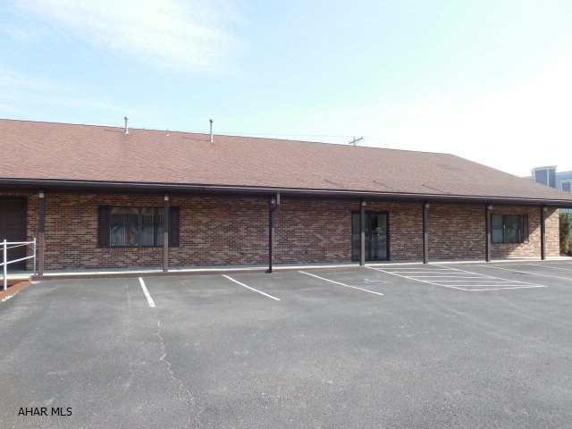 Spacious one story building with approx. 5,376 sq. ft. Partitions between offices can easilybe removed. GFA/CA. 2 furnaces in the attic and 3 AC on side of bldge. 400amp electric, two 200 amp sub panel boxes, security system(not activated)fire&smoke alarms, 2 restrooms. One dock.  Average utilities Gas $122.,Elec.$182./W/S$70. macadam parking lot with  20 parking spaces. Good traffic visibility and easy access into the bldg.