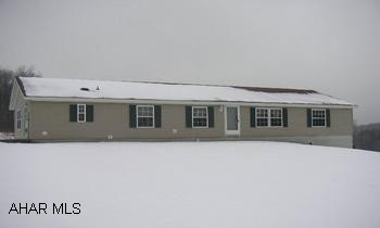 3 BEDROOM,  2 BATH-- DOUBLEWIDE ON 3 +/- ACRES 24 X 66 --1998 DOUBLEWIDE ON FULL FOUNDATION WITH INTEGRAL GARAGE.  SIITING ON APPROX 3 COUNTRY ACRES, UNIQUE FLOOR PLAN. PLEASE REMOVE SHOES!1
