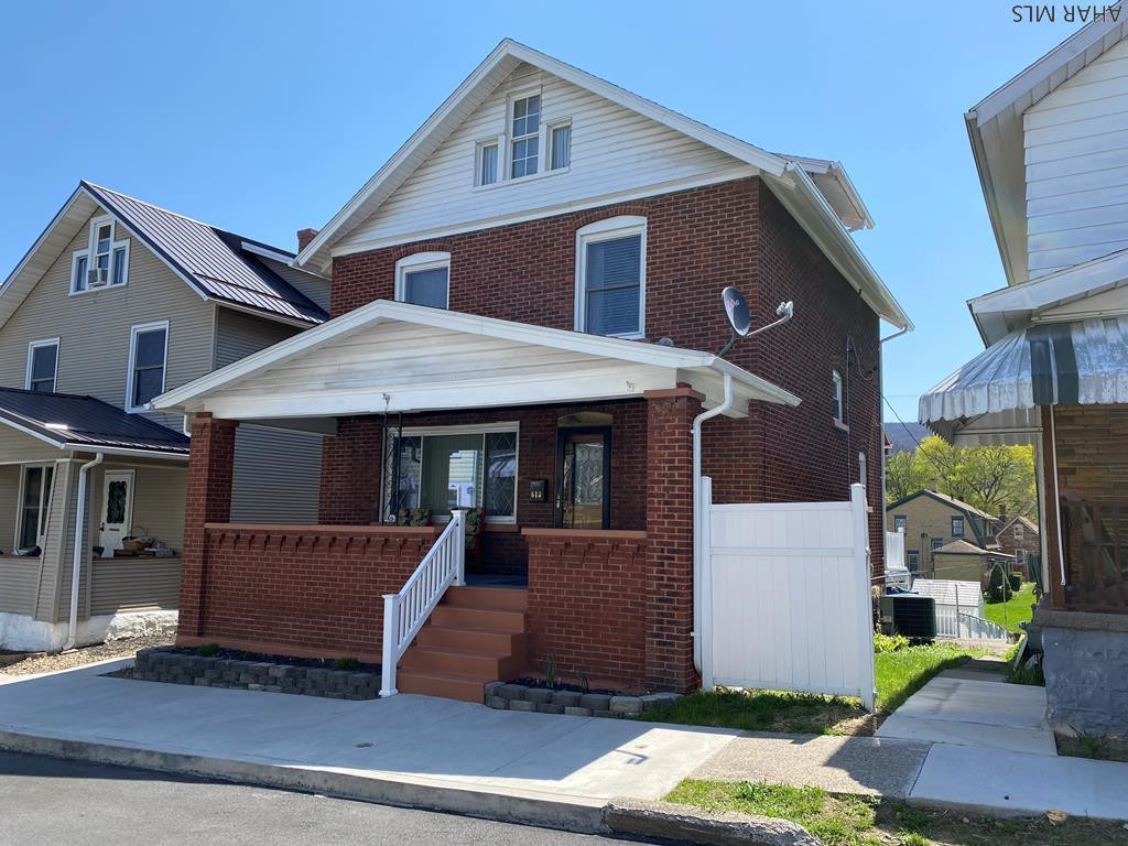 Tastefully updated and meticulously maintained brick home that's move-in ready!  With 3 bedrooms and 2 updated baths, newer kitchen, newer roof plus additional features that include central air, off-street parking and some fabulous outdoor space, this won't last.  You can be moved in in time to fully enjoy your summer on the deck with the new Sunsetter awning overlooking the inground pool plus there's an amazing front porch and lower patio area as well. Take a look, you won't be disappointed.
