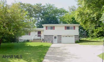 I-99, take 17th st exit. Right onto Pleasant Valley  turn left onto 7th St follow to Carl Ave, left onto 8th St. House sits back on right  Quality, Convenience, and Comfort!  No neighbors behind ! Security system installed not activiated; Large Shed in yard with garage door; nice screened in sunroom off kitchen; walk out basement exit; Newer kitchen cabinets, newer carpeting, tastefully decorated.  Well kept home! Lots of living space!