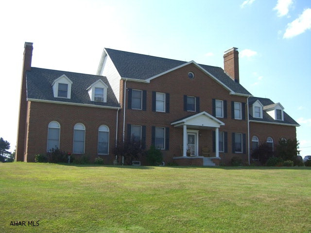 This magnificent home is located within 30 minutes of three local colleges and situated on 8.8 picturesque acres with great views of the surrounding mountains in every direction. Once inside you have living space for all your needs in this home. The large kitchen offers a spacious eat in are or you can utilize the formal dining room depending on what type of entertaining you prefer. There is a large great room with a wood burning fireplace offering an open concept view into the eat in kitchen. Upstairs you have four spacious bedrooms and a bonus/bedroom off of the master bed and bath, where you also have a fireplace, changing area and large walk in closet. The basement offers a separate living space with a sixth bedroom, full bath and living room.