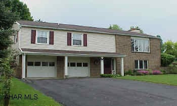 Unique raised ranch with post and beam vaulted ceiling, new windows, new stainless steel flue for furnace, remodeled family room w/ gas fireplace and wet bar.  Large open floor plan. Unique raised ranch with post and beam vaulted ceiling, new windows, new stainless steel flue for furnace, remodeled family room with gas fireplace and wet bar.  Large open floor plan.