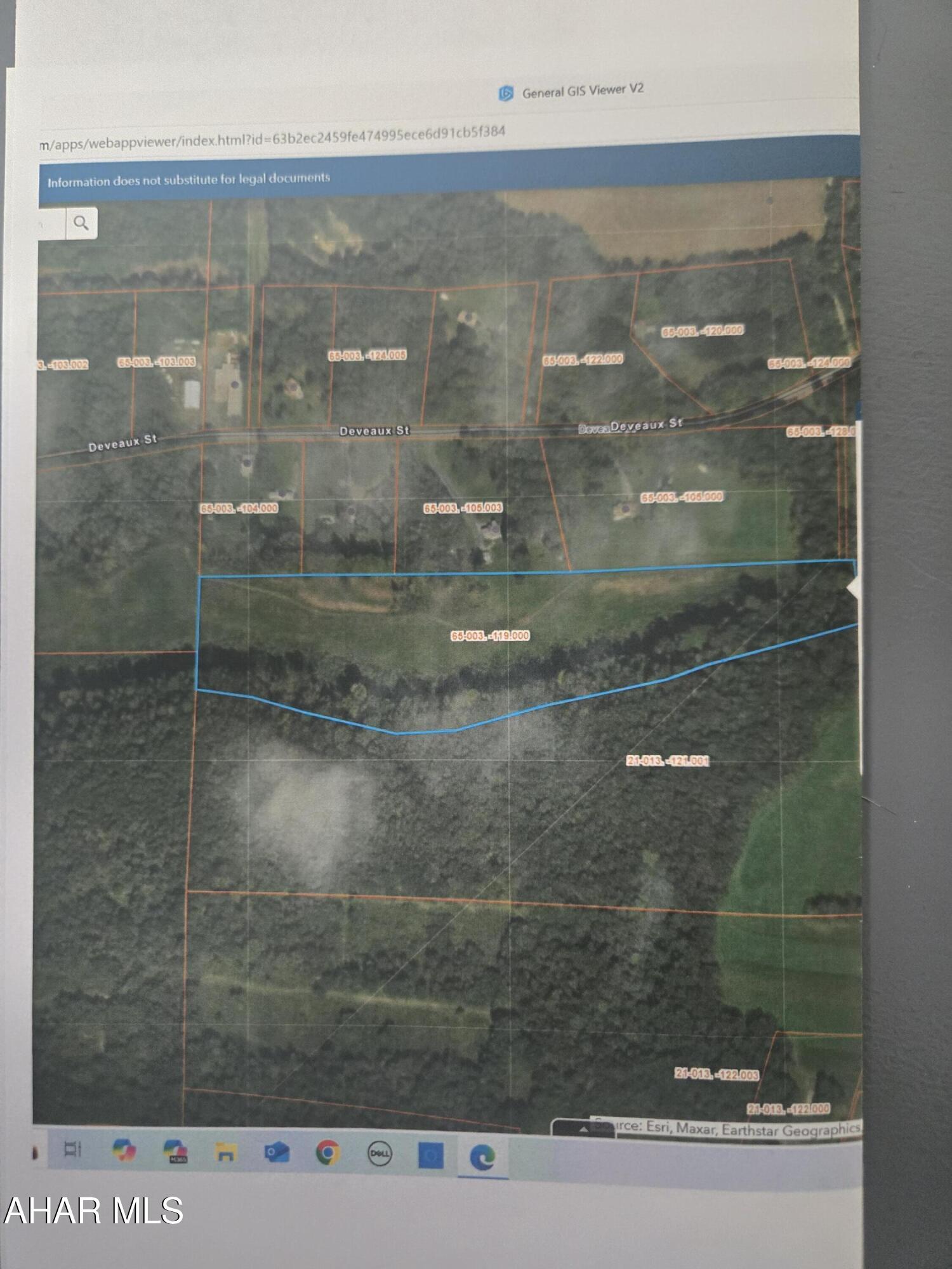 15.9 acres mostly cleared land with no hard road frontage or known right of way. Could make a nice building site - buyer responsible for finding access.