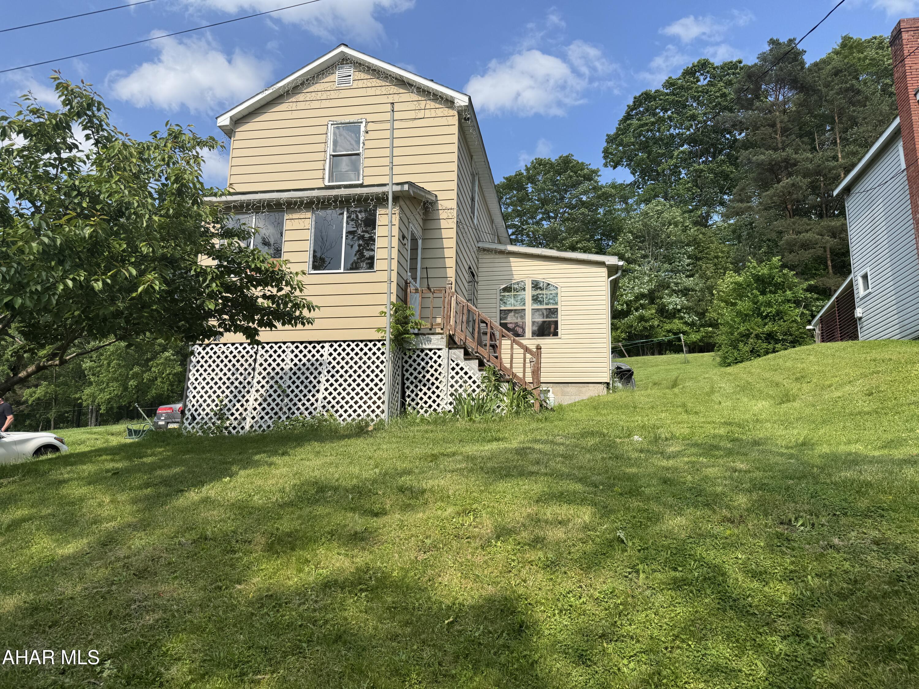 Partially remodeled home featuring 3 bedrooms (one captive) kitchen, living and dining room.  The bath is in the basement. Interior has been remodeled. Above ground pool just needs a liner. Great starter home.