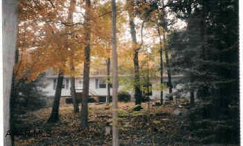 Lovely Rancher on over an acre wooded lot. Gas fireplace in living room. All new appliances, new carpeting, freshly painted.