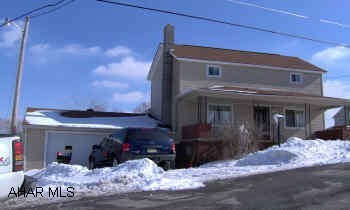 Remodeled inside and out two story home. Interior has been redrywalled. Siding, roof, etc. recently replaced. 1.5 car garage. Could be three bedrooms.
