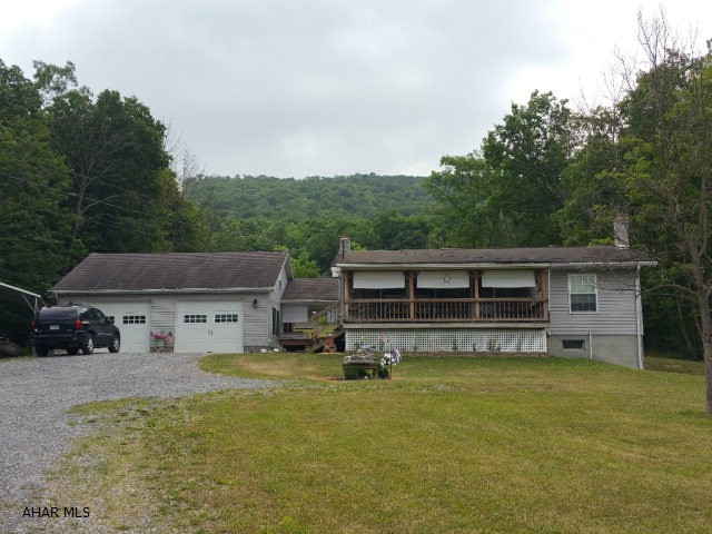 Very nice 2 bedroom rancher with newly remodeled kitchen on 3.4 acres. Family room. 2 car detached garage. Separate 2 story workshop. Above ground pool.