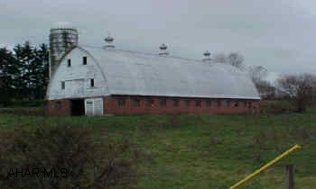 Brick Barn +12.9 Acres House is in Borough of Hollidaysburg. Both House & Barn Need TLC. All 5 Parcels being sold as one  property for $1,400,000.