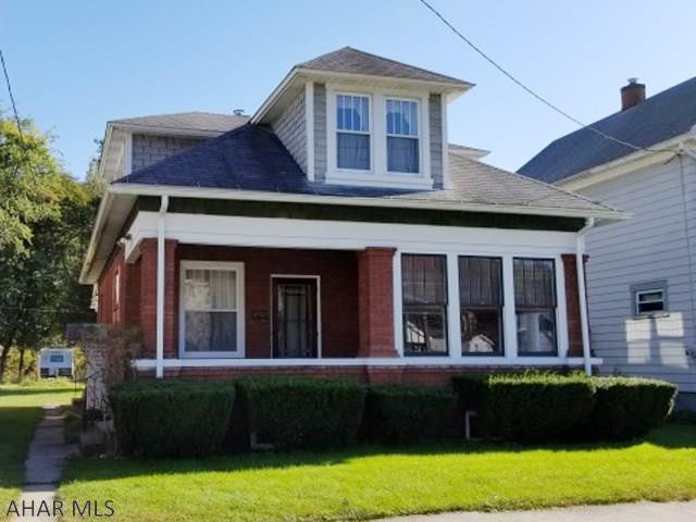 1 1/2 story, 3 bedroom brick home in nice residential neighborhood. 1st floor bedroom and bathroom. Natural woodwork.