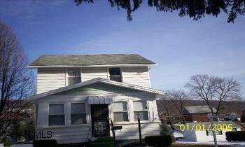 A great house located close to B. G. school. Newer flooring, spacious dining room, 2 car garage on a 90x120 flat lot. Enclosed porch. All appliances included.