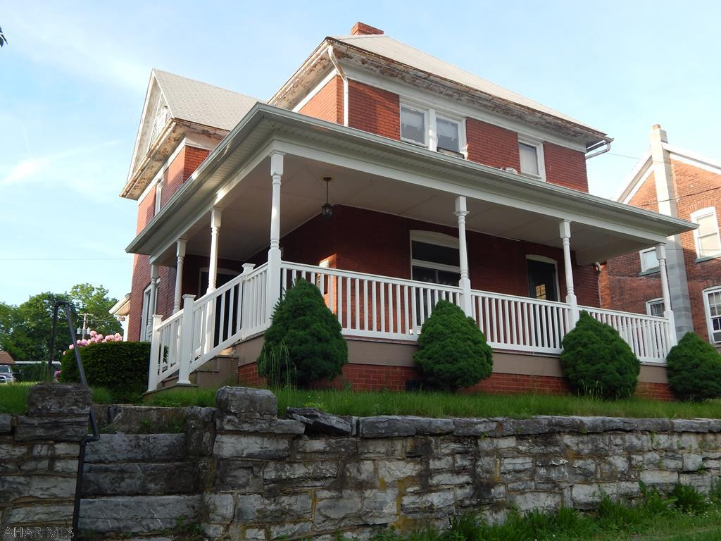 The owners invite you to see this charming 2 story home with a huge wrap around porch. The home also features 3 restful bedrooms, 1 full bath,  a spacious living room, propane gas fireplace, hardwood floors, central vacuum system, beautiful updated kitchen and bathroom, all windows have been replaced except 3 on the 2nd floor. Nice sized backyard great for entertaining friends or family. Off street parking in back. Contact me for more details or to schedule your private tour today!
