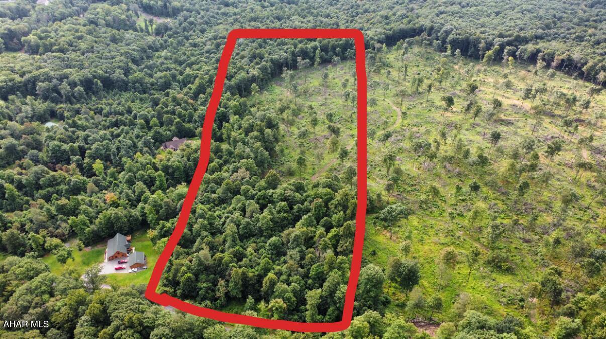 Great building site for your Dream Home !!! Wooded and Private,10 acres tucked away in the mountains with a private access road to the property including a road frontage. The private road is very well taken care and easy to access. The property has perk for a 4 bedroom home but will need reinstated through the Twp. Seller has documents. Survey is available!!  Lot 7 Mountain View Estates