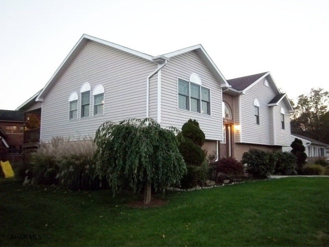 This huge home is move in ready! Open floor plan with new kitchen. All 3 baths are new including MBR with jetted tub. Private deck off the rear of the house, accessed from MBR or dining room. FP in family room, 3 BR, 3 BA, oversized 2 car garage. Storage everywhere you look. Overhead storage in attic with built in shelving. This home will not last. Beautiful landscaping & flat yard.