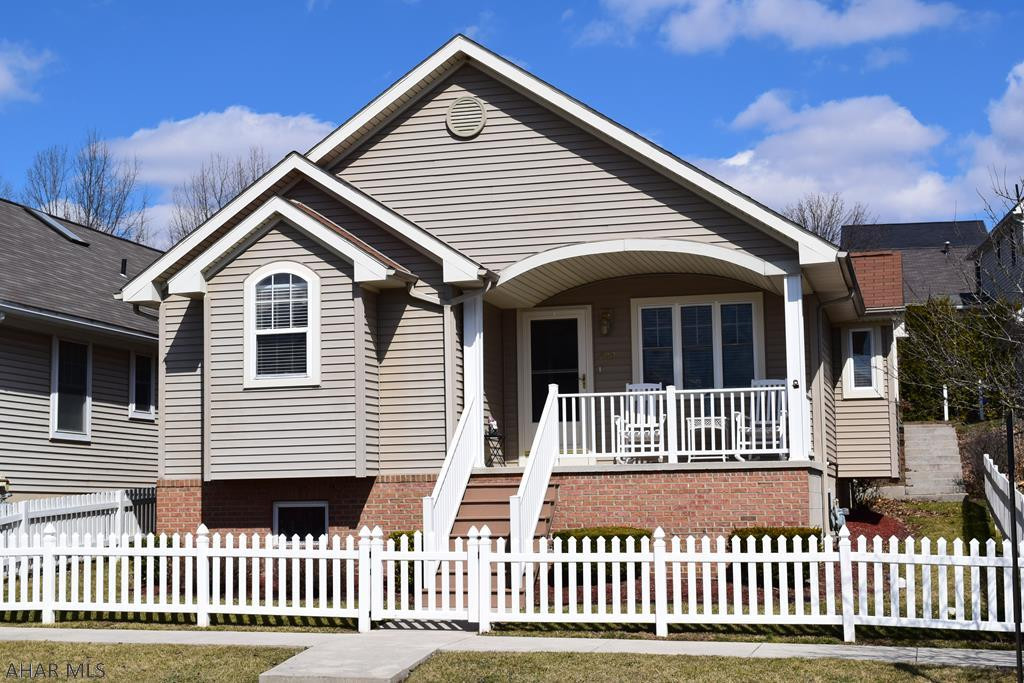 Beautiful open concept two bedroom, two bath home with a full finished basement in the desirable Holliday Hills area of Hollidaysburg. This home offers a private sun room, a cover porch with spectacular views, a detached garage and an off street parking pad. These homes sell quickly. Call listing agent today for your private tour.
