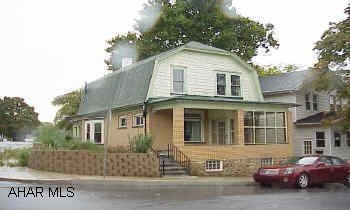 Some new windows, newer gas FHA furnace, newer electric service, lots of charm, and large rooms.