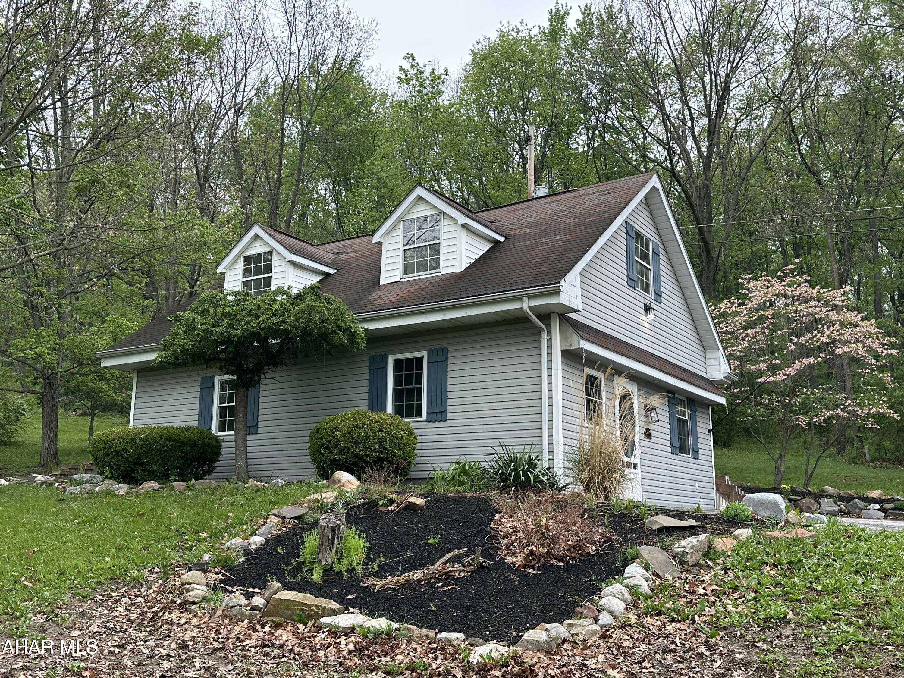Check out this beautiful setting in Duncansville with over 0.5 acre of land, you are going to love the patio and deck that would be great for entertaining or for a morning of solitude, flexible floor plan with potential for a bedroom on the main floor, full bath on main floor, upper level has vaulted ceilings with two bedrooms, lots of closet space including a large walk-in closet, full bath and laundry, new flooring on the upper level, new retaining wall, freshly painted interior, new lights, central air