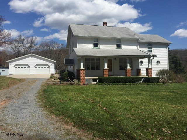 Beautiful home on 1.813 ac. Home is immaculate with updated windows, large addition, cedar lined window storage bench and detached 2 car garage. Hardwood floor under carpet in living room and dining room. Large walk in closet in upstairs master bedroom. Central vacuum, central air and many more amenities.