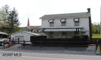 4 BEDROOM HOME WITH 1 1/2 BATHS, MINT CONDITION.  LARGE GARAGE. 80 X 200 LOT.