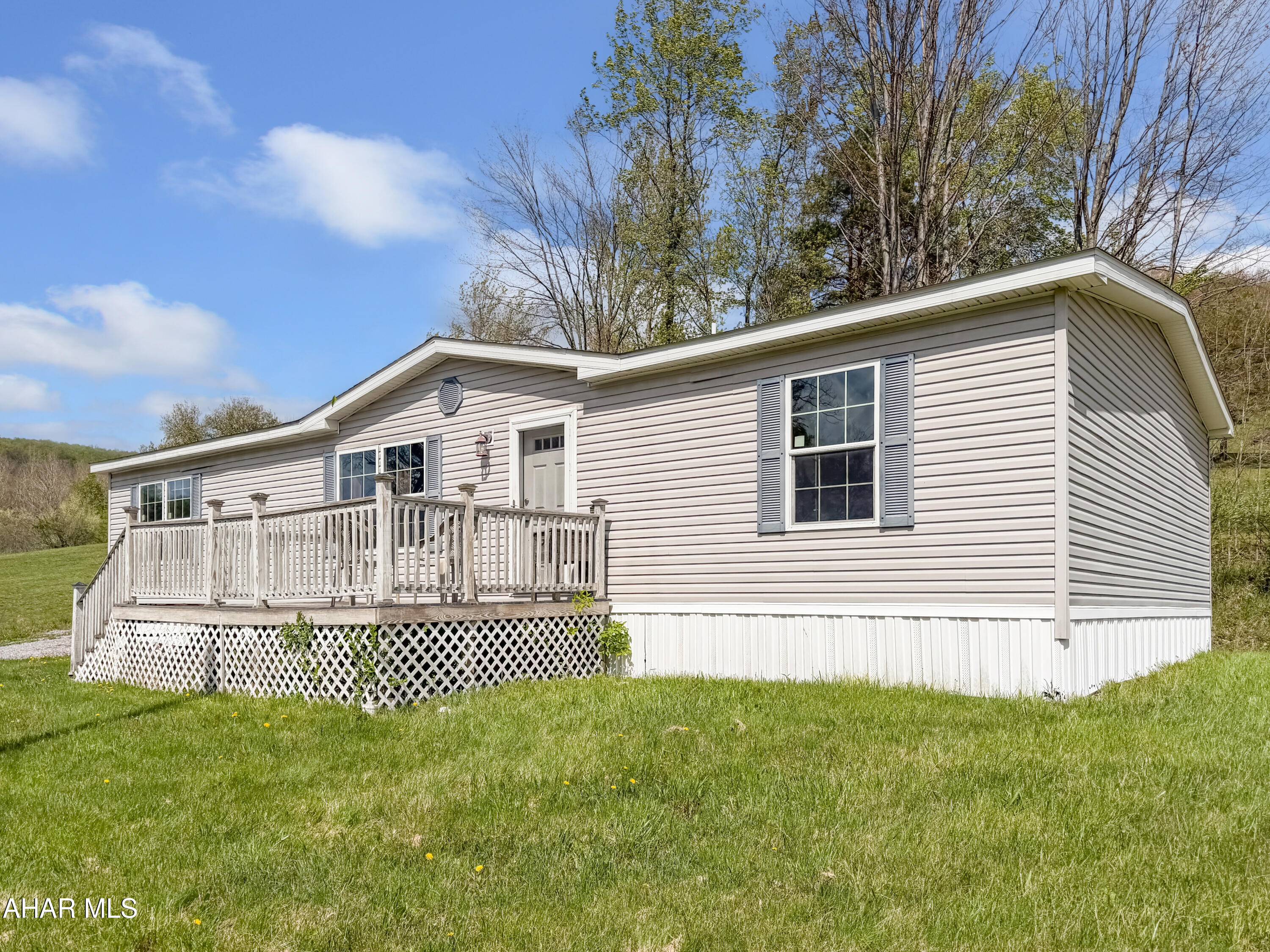 Welcome to 764 Expedite Road in Blacklick Township! This well-maintained 2016 double-wide offers modern comfort and an open, functional layout on a spacious lot. Step inside to a bright and inviting living room that flows seamlessly into a beautifully updated kitchen featuring a large center island, ample cabinetry, and an adjacent dining area. The home also includes a huge pantry and a convenient mudroom/laundry area for added storage and practicality. The private primary suite offers a relaxing retreat with a walk-in closet and a full bathroom complete with a large tile shower and soaking tub. Two additional generously sized bedrooms and a second full bathroom provide plenty of space for family or guests. Outside, enjoy a welcoming front deck, a large yard, off-street parking, and a storage shed for all your needs. Move-in ready and offering both space and comfort. Don't miss your opportunity to make this one yours. Call today for a private tour!