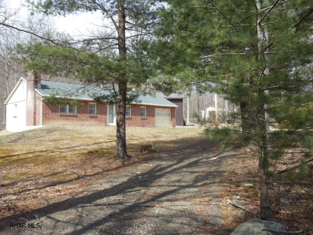 Use as a residential or perfect for hunter or fisherman! Nice 1-Story, fully furnished with 1-car attached garage. 20x20 Pole Barn. Approximately 1/2 hour to Cowan's Gap State Park Swimming and Boating. 3.26 acres wooded property with some pines. In Orbisonia. J-055
