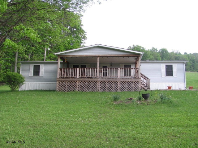 Enjoy the simple life in this 3 bedroom 2 1/2 bath doublewide on 3+ acres. Newer roof, windows and kitchen.. Great 24x24 heated 2 car detached garage. and so much more.